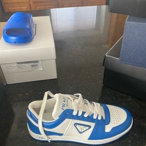 Prada Downtown leather sneakers and soft slides
